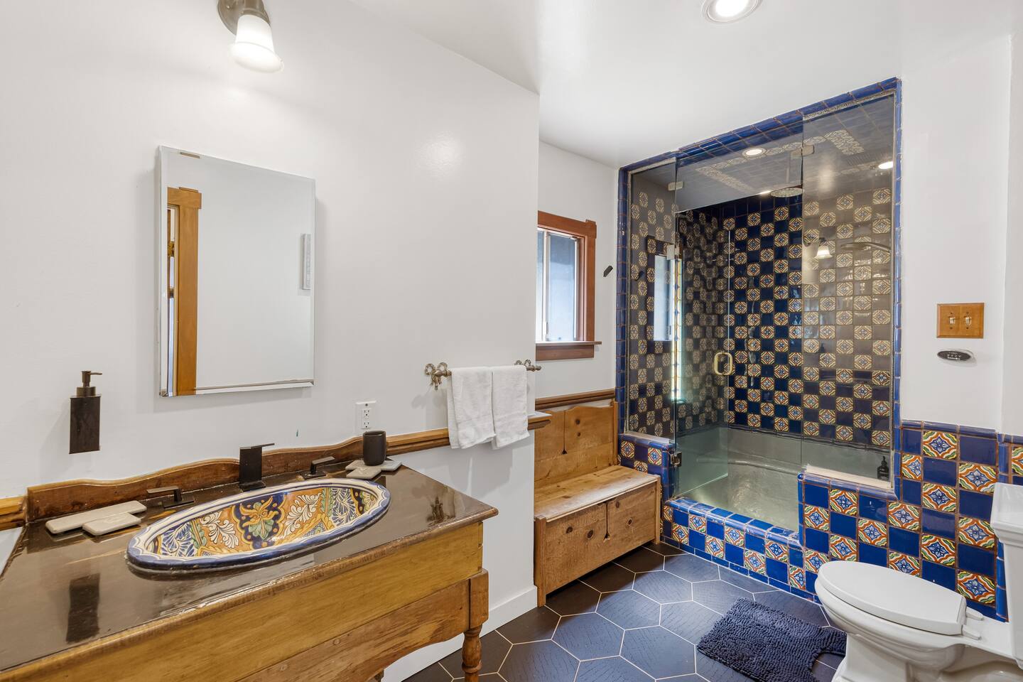 Main bathroom with Spanish tiled sink